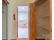 Pink tiled bathroom with shower and linen closet at 1925 Montclair Ave, Gastonia, NC 28054