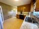 Kitchen with wood cabinets, updated countertops, and electric range at 140 E Chamblee Dr, Salisbury, NC 28147