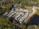 Aerial view of houses surrounding a pond at 413 Kingsway Cir, Charlotte, NC 28214