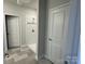 Bathroom with shower, tile flooring and a door at 112 Imperial Way # 2A, Albemarle, NC 28001