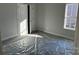 Well lit bedroom with new carpet and double doors at 112 Imperial Way # 2A, Albemarle, NC 28001