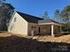 Tan house with covered patio and nice backyard at 112 Imperial Way # 2A, Albemarle, NC 28001