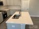 Kitchen island with quartz countertop and double sink at 112 Imperial Way # 2A, Albemarle, NC 28001