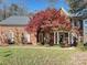 Brick home with autumn leaves and landscaping at 3481 Fieldstone Dr, Gastonia, NC 28056