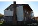 Exterior view of a damaged house with peeling siding at 138 Hatley Farm Ln, Stony Point, NC 28678