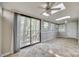 Sunroom with tile floors, skylights, and access to the outdoors at 151 Cedar Hollow St, Fort Mill, SC 29715