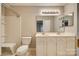 Bathroom with double vanity, shower, and toilet at 151 Cedar Hollow St, Fort Mill, SC 29715