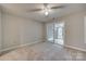 Spacious bedroom with sliding glass doors to a private patio at 151 Cedar Hollow St, Fort Mill, SC 29715