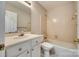 Bathroom with tub, toilet and vanity at 151 Cedar Hollow St, Fort Mill, SC 29715
