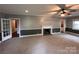 Spacious living room with fireplace and access to bathroom at 131 Glendale Se Ave, Concord, NC 28025