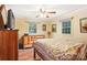 Bedroom with wood floors, double bed, and plenty of light at 1026 Holly Dr, Gastonia, NC 28054