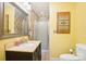 Bathroom with shower stall, tiled walls, and vanity at 1026 Holly Dr, Gastonia, NC 28054