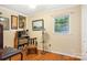 Small bedroom with hardwood floors, and a window at 1026 Holly Dr, Gastonia, NC 28054
