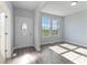 Bright entryway with hardwood floors, large windows, and view of fields at 1026 Heath Helms Rd, Monroe, NC 28110