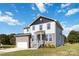 Beautiful two-story home with stone accents and a two-car garage at 1026 Heath Helms Rd, Monroe, NC 28110