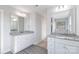 Bathroom boasts double vanity with granite countertop and large mirror at 1026 Heath Helms Rd, Monroe, NC 28110