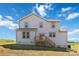 Two-story house with gray siding, wooden deck, and stairs at 1026 Heath Helms Rd, Monroe, NC 28110