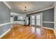 Dining room features hardwood floors and access to kitchen at 749 W Brooklyn Ave, Lancaster, SC 29720