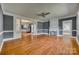 Hardwood floors, gray walls, and a fireplace at 749 W Brooklyn Ave, Lancaster, SC 29720