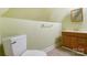 Clean bathroom with wood vanity and tile flooring at 156 W Statesville Ave, Mooresville, NC 28115