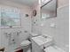 Clean bathroom with white tile, vanity, and toilet at 1012 Linwood Rd, Kings Mountain, NC 28086