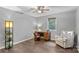 Bright bedroom with hardwood floors and built-in desk at 140 Liz Cortland Rd, China Grove, NC 28023