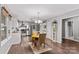 Open concept kitchen features stainless steel appliances and white cabinets at 140 Liz Cortland Rd, China Grove, NC 28023