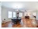 Elegant dining room with hardwood floors and ample natural light at 1345 Wildflower Dr, Gastonia, NC 28056