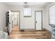 Bedroom with wood floors and access to the hallway at 515 Suttle St, Shelby, NC 28150