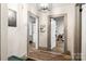 Clean hallway with light walls and access to multiple rooms at 515 Suttle St, Shelby, NC 28150