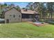 Brick house exterior with screened porch and patio at 225 Greenway Ave, Cherryville, NC 28021