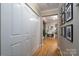 Bright hallway with hardwood floors and ample closet space at 272 Millingport Ln, New London, NC 28127