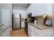 Modern kitchen with stainless steel appliances and granite countertops at 272 Millingport Ln, New London, NC 28127