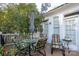 Deck with seating for outdoor dining and relaxation at 272 Millingport Ln, New London, NC 28127