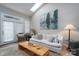 Cozy living area with a comfortable sofa and access to backyard at 272 Millingport Ln, New London, NC 28127
