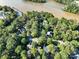 Aerial view of waterfront homes and community with boat docks at 272 Millingport Ln, New London, NC 28127