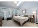 Spacious bedroom with a king-size bed and plenty of natural light at 272 Millingport Ln, New London, NC 28127