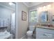 Charming bathroom with a granite vanity and updated fixtures at 272 Millingport Ln, New London, NC 28127