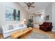 Bright living room featuring hardwood floors and ample seating at 272 Millingport Ln, New London, NC 28127
