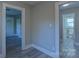 Clean hallway with new flooring, leading to bedrooms and bath at 211 Maple St, Shelby, NC 28150