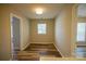 Small bedroom with hardwood floors and a window at 5204 Holbert Cir, Charlotte, NC 28269