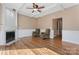 Bright living room with hardwood floors, fireplace, and access to hallway at 2720 Lentz Rd, China Grove, NC 28023