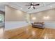 Living room with hardwood floors and wainscoting at 2720 Lentz Rd, China Grove, NC 28023