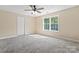 Well-lit bedroom with ceiling fan and window at 2720 Lentz Rd, China Grove, NC 28023