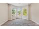Bright bedroom with bay window and carpet at 2720 Lentz Rd, China Grove, NC 28023