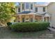 Covered porch with white railings and columns at 2720 Lentz Rd, China Grove, NC 28023