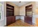 Spacious home office with L-shaped desk and built-in shelving at 2720 Lentz Rd, China Grove, NC 28023