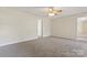 Bright bedroom with ceiling fan and carpet at 2720 Lentz Rd, China Grove, NC 28023