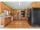 Kitchen with wood cabinets, double oven, and hardwood floors at 2720 Lentz Rd, China Grove, NC 28023