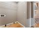 Functional laundry room with shelving and hookups at 2720 Lentz Rd, China Grove, NC 28023